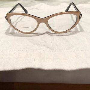 Cat eye Eyeglasses Unique beige color .Has prescription bifocal lens in them .